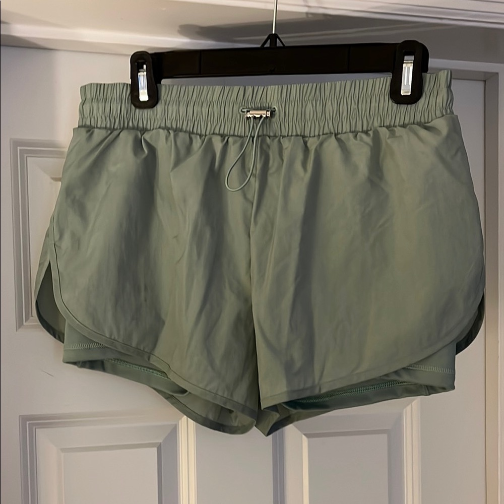 Victoria's Secret, sage green running shorts size medium.